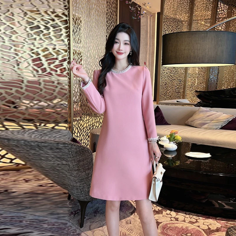 2023秋冬新款小香风重工钉珠纯色宽松A字连衣裙