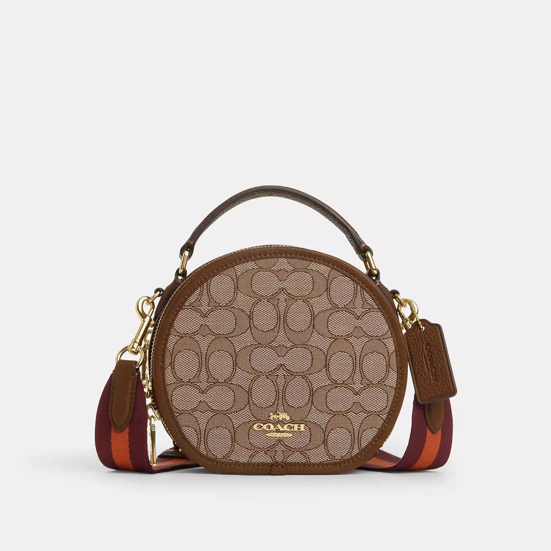COACH/蔻驰焦糖logo帆布宽肩带手提圆饼包 CO986IMVGB