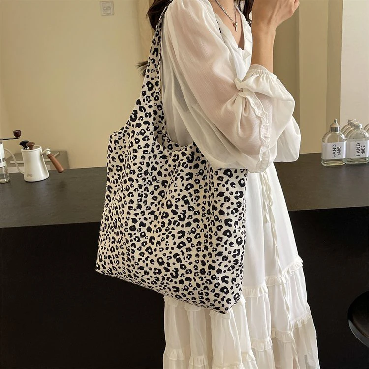 大容量通勤豹纹包女2024新款小众百搭原创设计单肩帆布托特包袋女