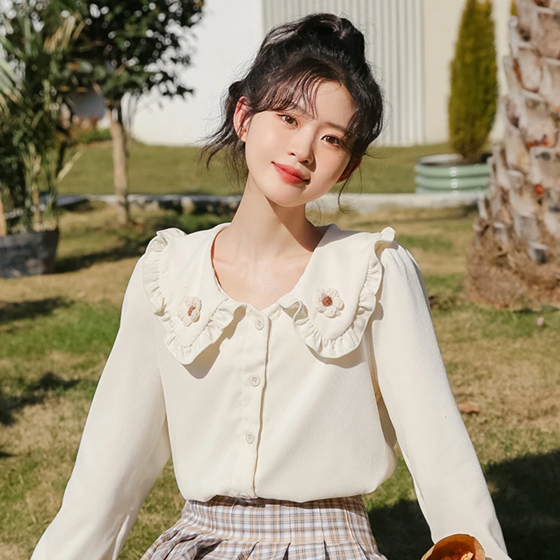 帛卡琪2023秋季新款宽松娃娃领花朵衬衫女法式小众高级感长袖衬衣