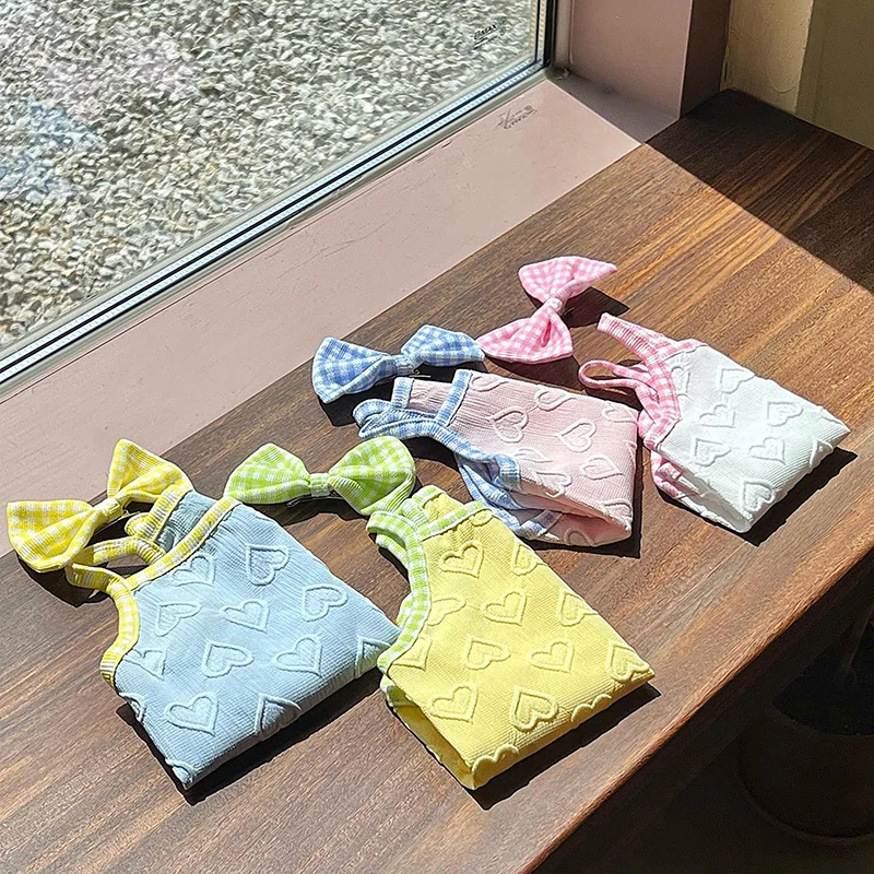 [达人]狗狗夏季薄款爱心浮雕纹理吊带背心狗衣服透气比熊泰迪0021