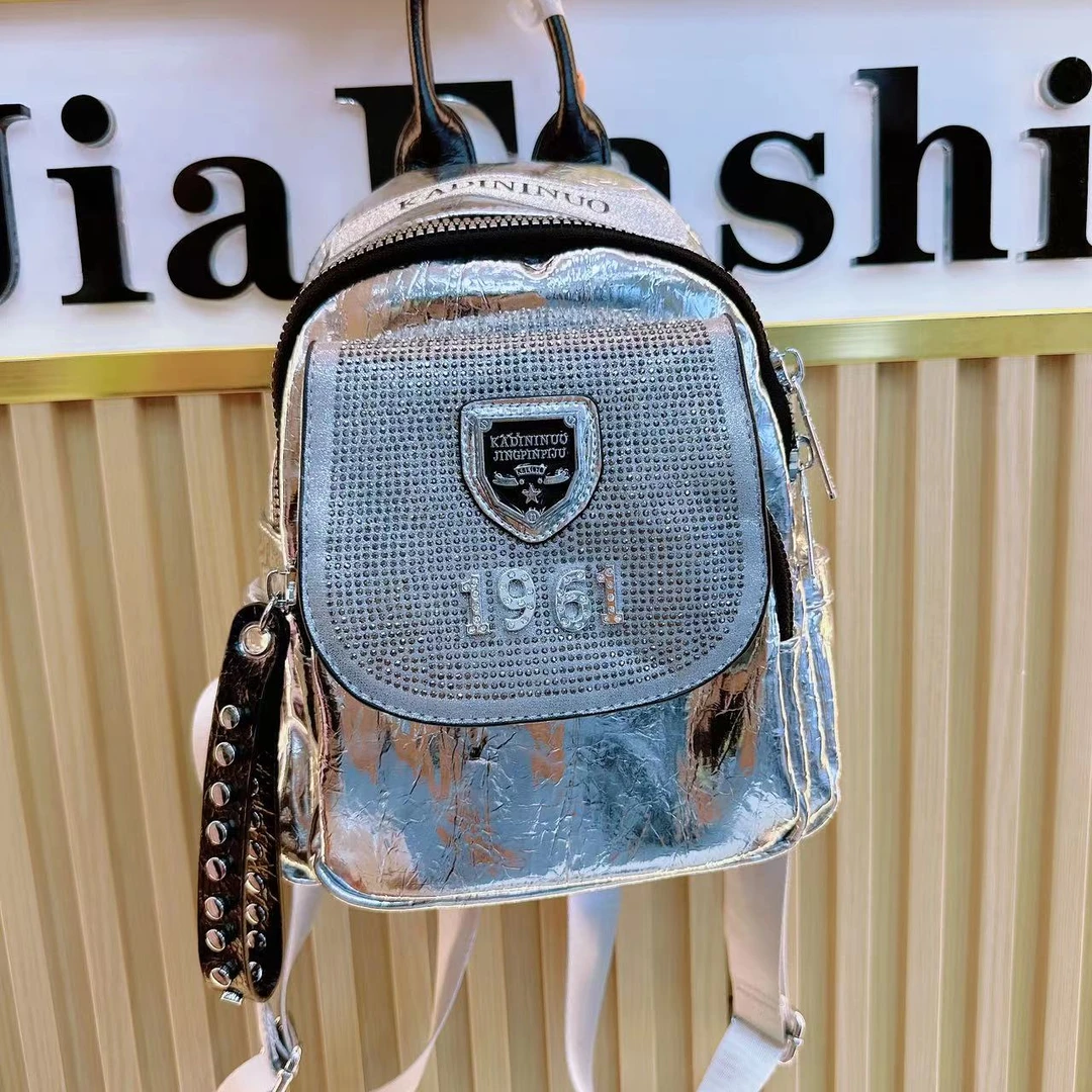 烫钻多用背包女士2024新款潮流双肩包银色软皮休闲旅行包书包小众