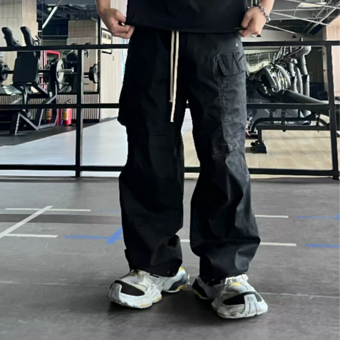 RO风格蜡染涂层工装裤百搭宽松黑色潮流抽绳多口袋休闲裤