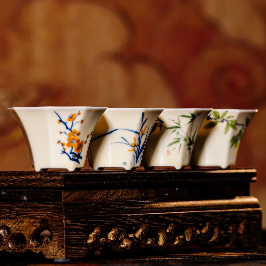 【西泠上新】宣纸黄“梅兰竹菊”名家手绘小八方杯HX0406a