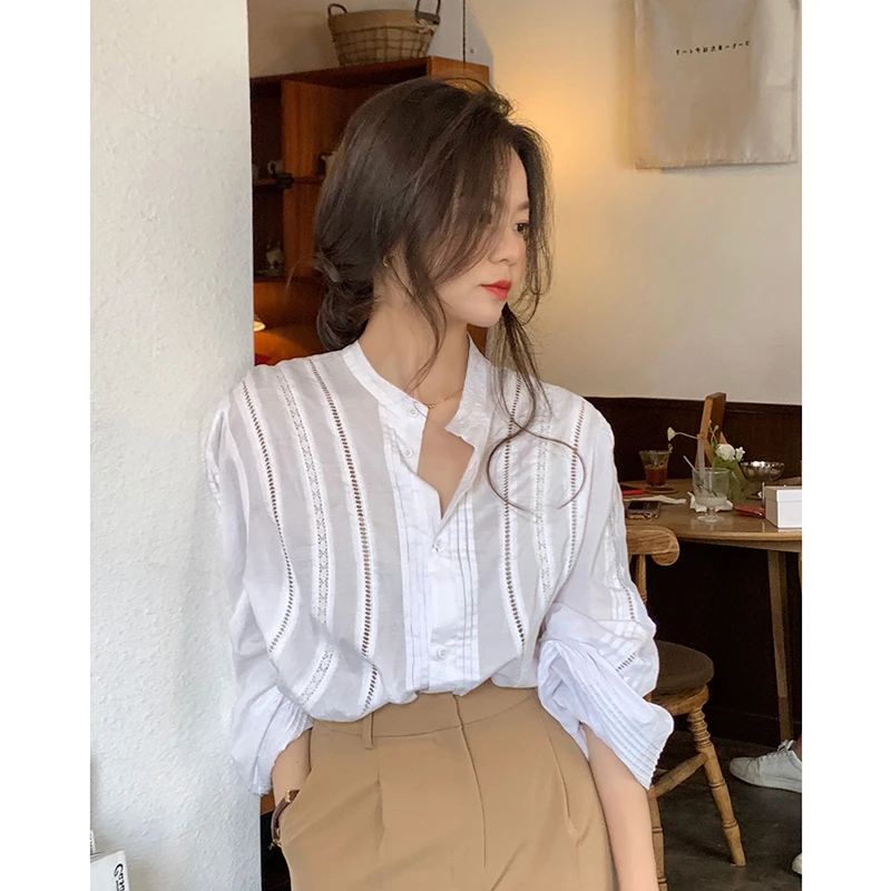 白衬衫女独特设计感小众春秋新款洋气时尚复古法式别致上衣泡泡袖