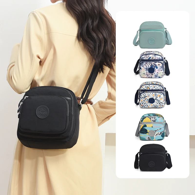 新款女士休闲包斜挎包轻便单肩包上班通勤简约小包包防水牛津布包