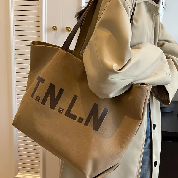 大容量帆布包包女2025新款高级感时尚单肩包简约托特包便携通勤包