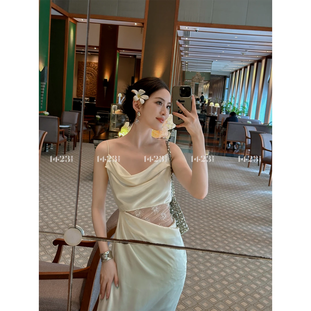 1423【悠然假期】腰部蕾丝拼接不规则吊带连衣裙