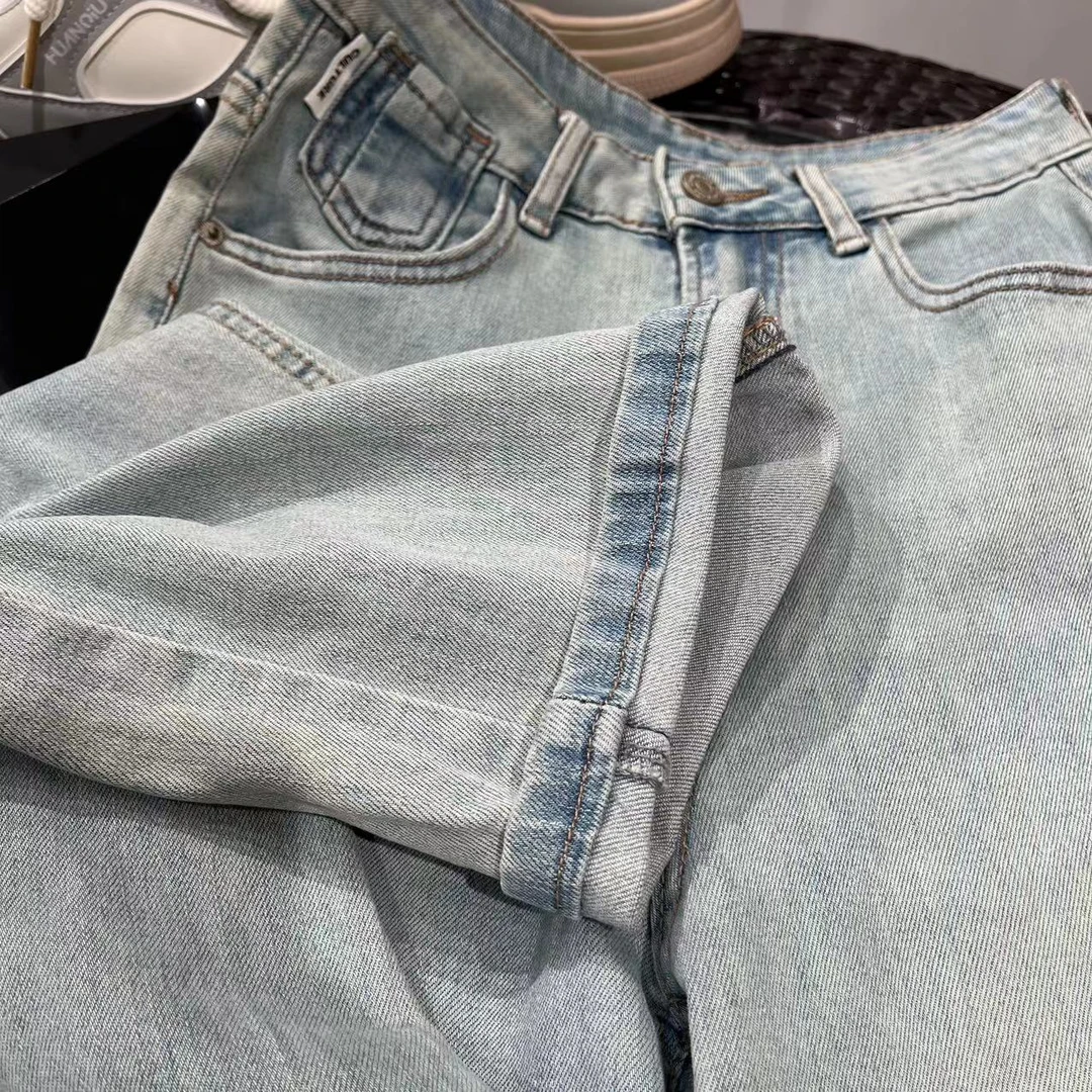 W00701浅蓝色窄版遮胯显腿长牛仔裤（扣眼已开裤脚挽起介意勿拍）