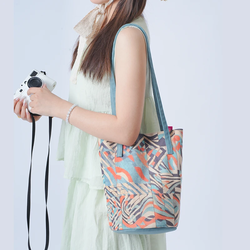 弘娜设计师原创新中式国潮风单肩手提包时尚百搭肩带水桶包便携AD