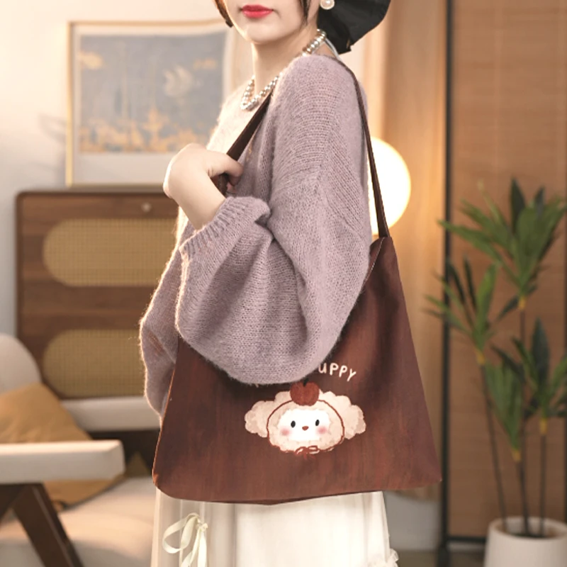 弘娜秋冬原创可爱百搭苹果小羊手提单肩包女士百搭小众通勤包包AI