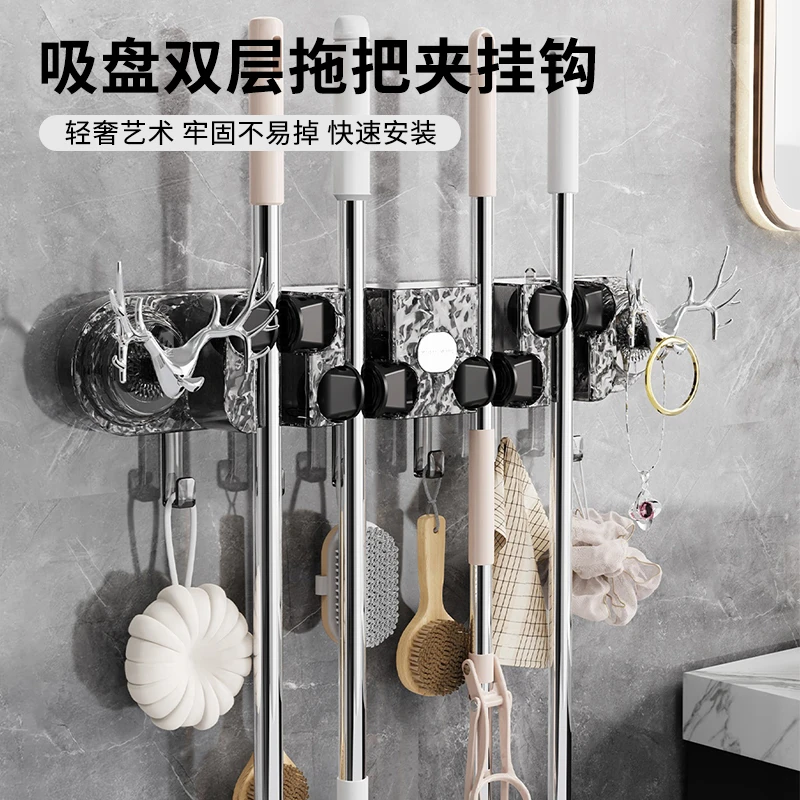 吸盘双层拖把夹挂钩家用置物架新款轻奢固定架免打孔卫生间壁挂夹