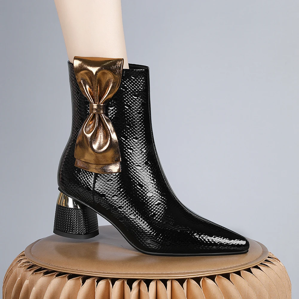 妮彩诗新款欧美尖头气质黑色时尚气质短靴舒适真皮粗跟8861