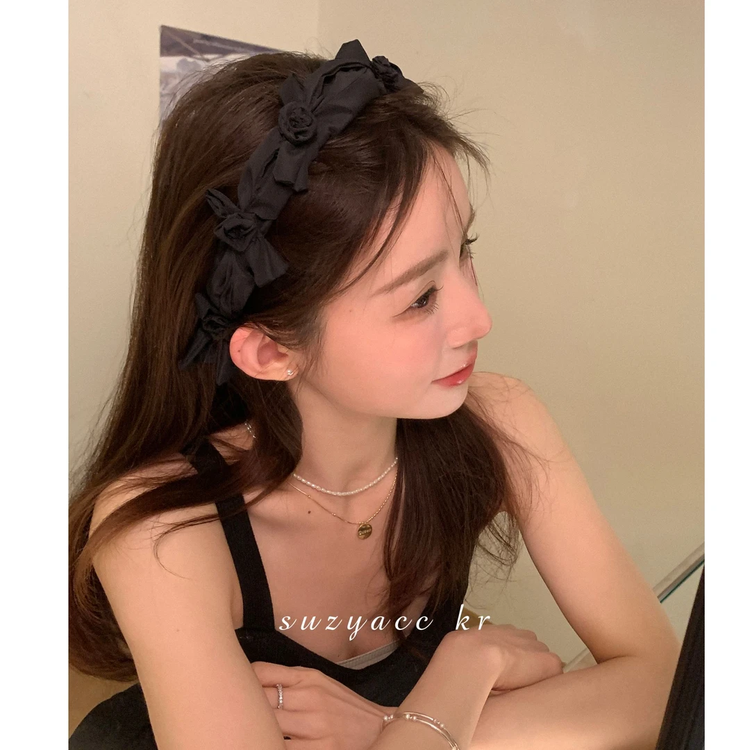 Suzyacc Kr气质网红小众设计感花朵黑色蝴蝶结布艺发箍超仙F2466