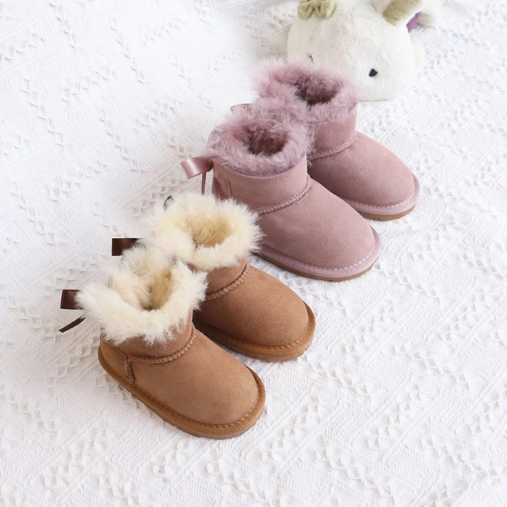 【现货包邮】河南桑坡儿童蝴蝶结羊皮毛一体ug雪地靴宝宝单丝带防滑