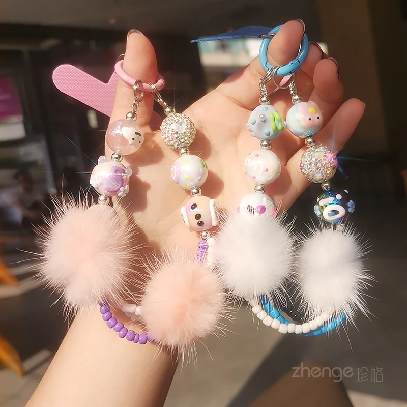 手机挂绳双毛球涂鸦水钻圆珠手链短款手腕手机挂饰挂链绳卡条