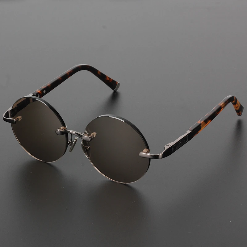 东海高档老石头水晶开车太阳镜护目男士无框中老年经典平光墨镜