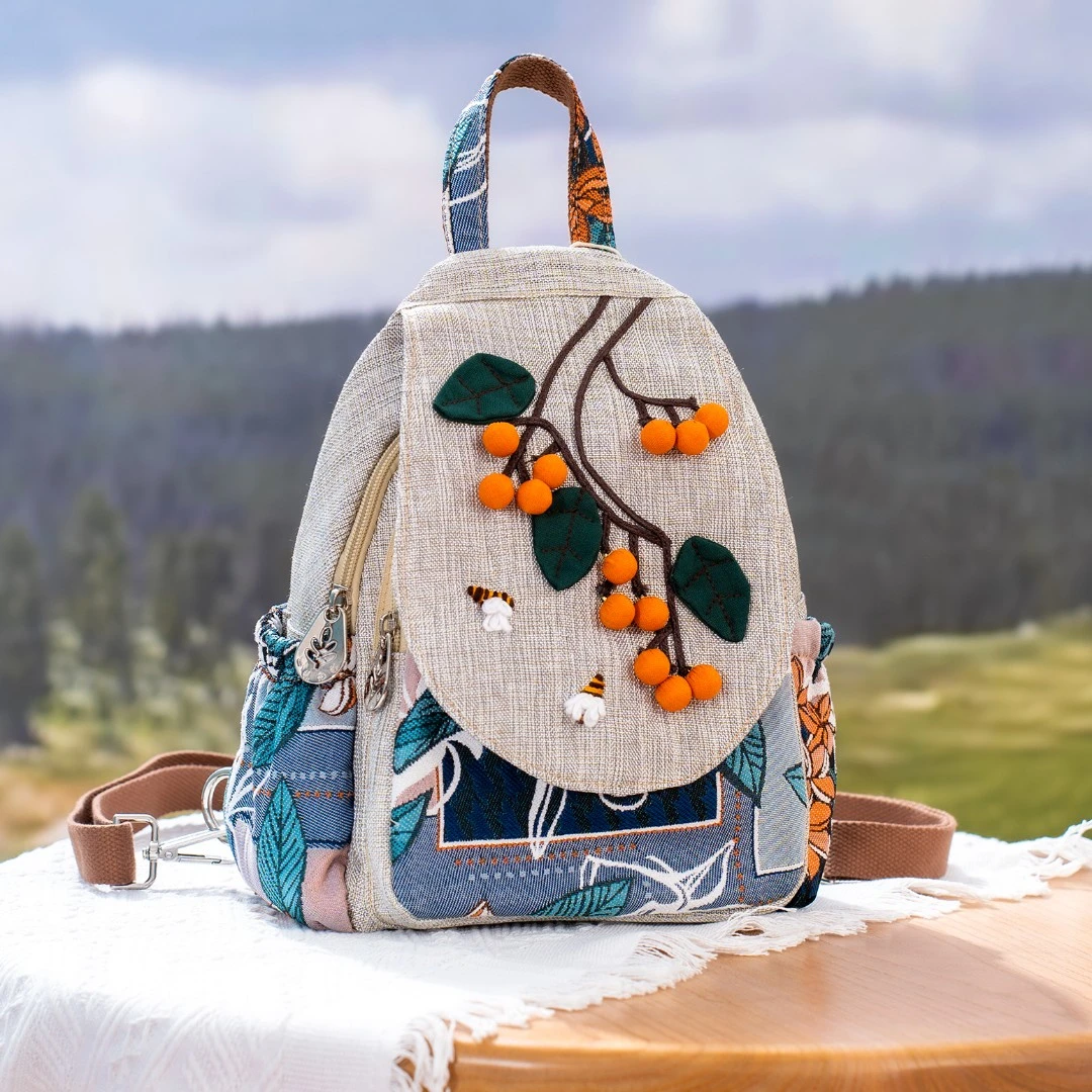 帆布轻便休闲双肩包文艺多隔层斜挎立体手工编织柿柿如意轻便背包