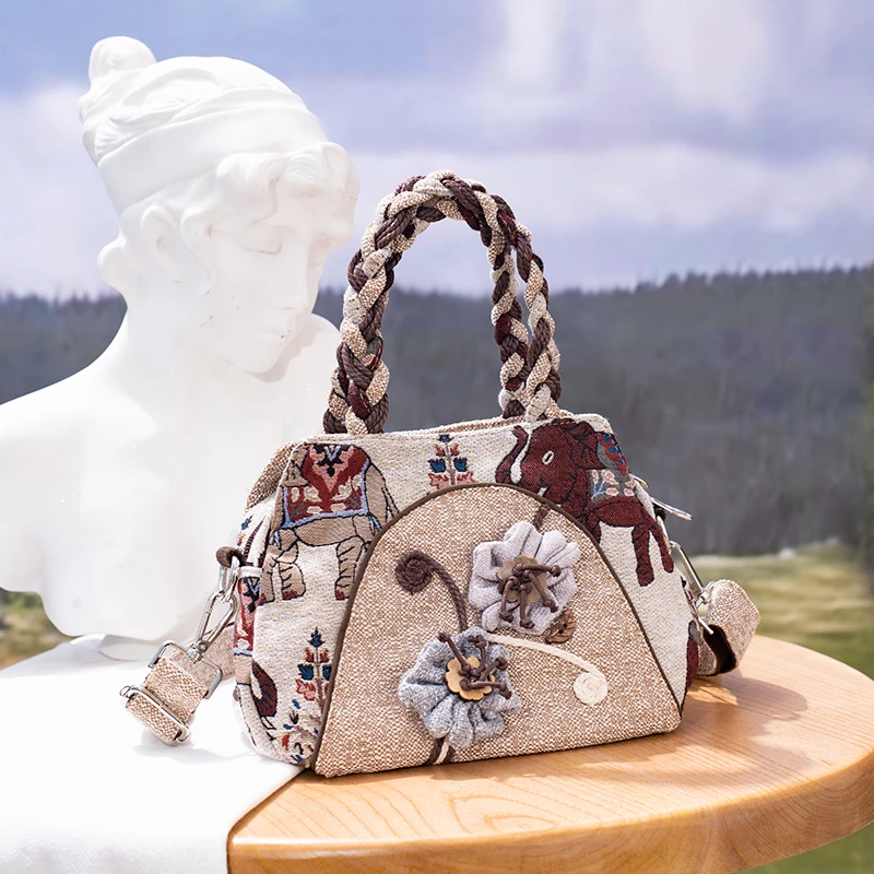 新款民族风手提包中国风单肩斜挎帆布女包布艺百搭两用休闲通勤包