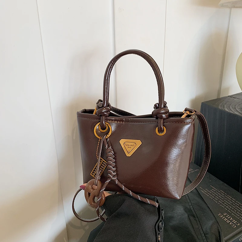 高级感美拉德手拎包包女式2024秋冬寄复古百搭通勤单肩斜挎水桶包