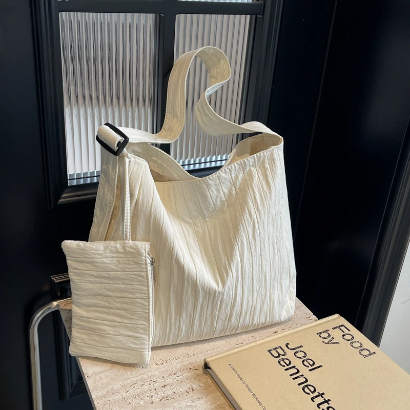 小众大容量帆布包包女2025新款早八通勤斜挎包简约上课单肩托特包