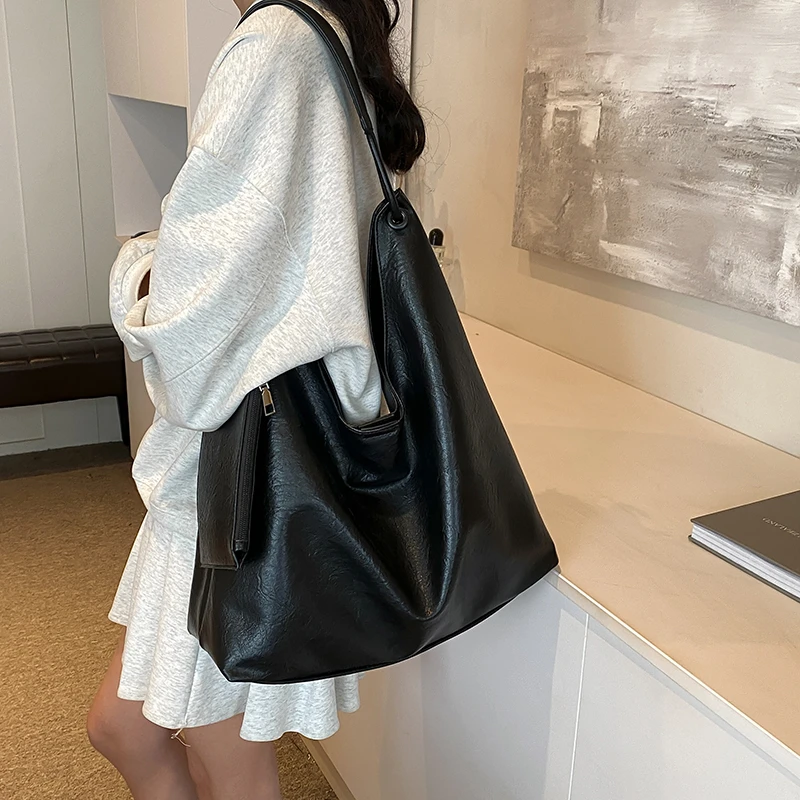 韩系大容量通勤包包女式2025新款秋季时尚单肩腋下包百搭托特包包