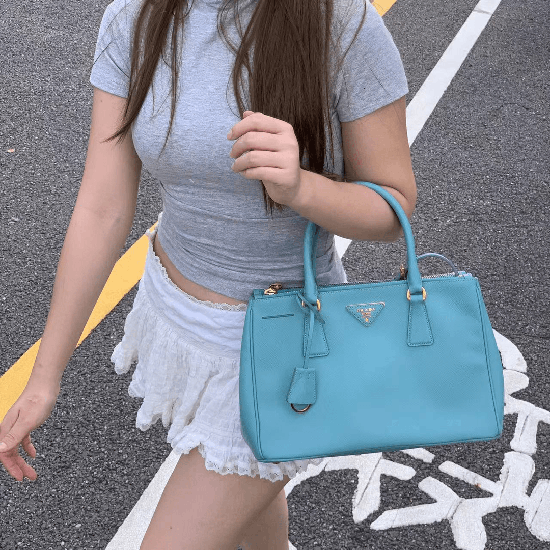 95新 Prada/普拉达 一口价普拉达杀手蓝色手提斜挎包D1474