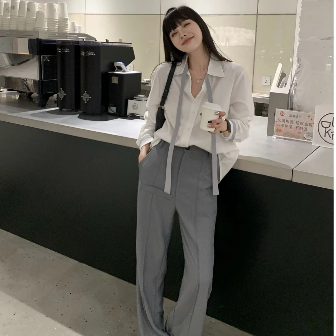 白色拼接polo领长袖衬衫秋女2025设计感小众宽松休闲百搭气质衬衣