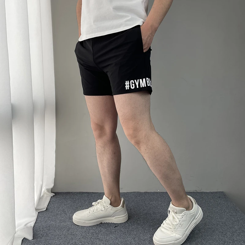 四面弹速干运动短裤男三分裤 双层透气健身跑步3分裤夏季性感舒服