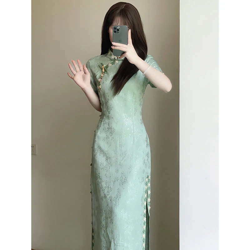新中式国风改良旗袍2024年夏季新款清新波浪裙摆少女绿色连衣裙春