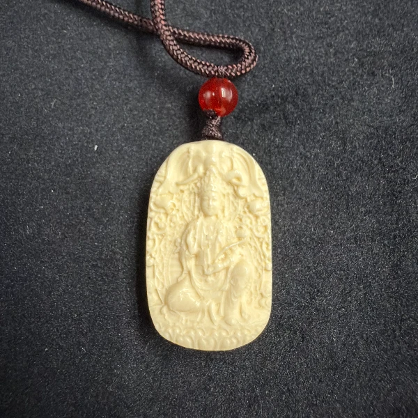 P71015天然猛犸牙普贤菩萨吊坠 支持鉴定 假一罚四