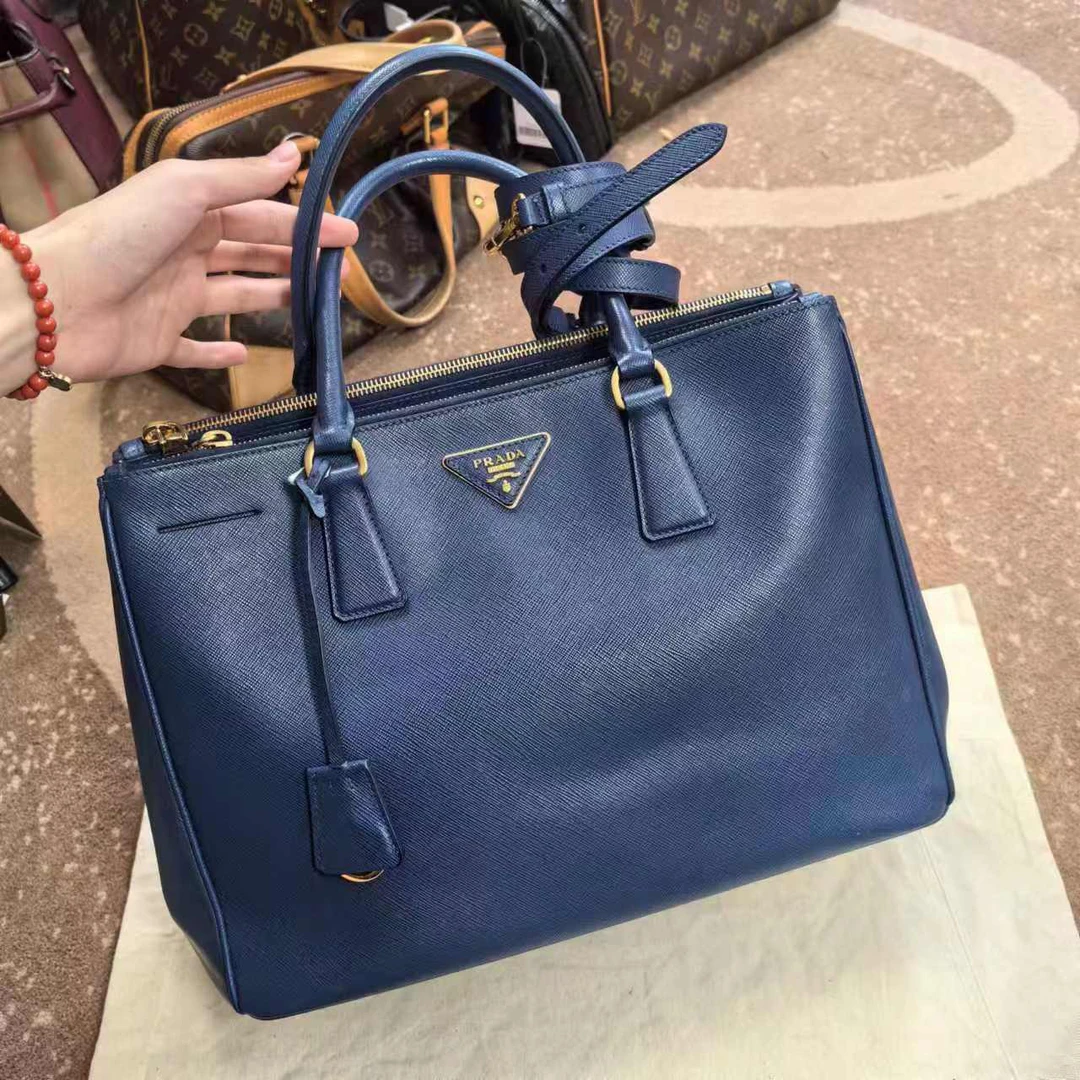 95新 Prada/普拉达 深蓝色金标十字纹杀手包