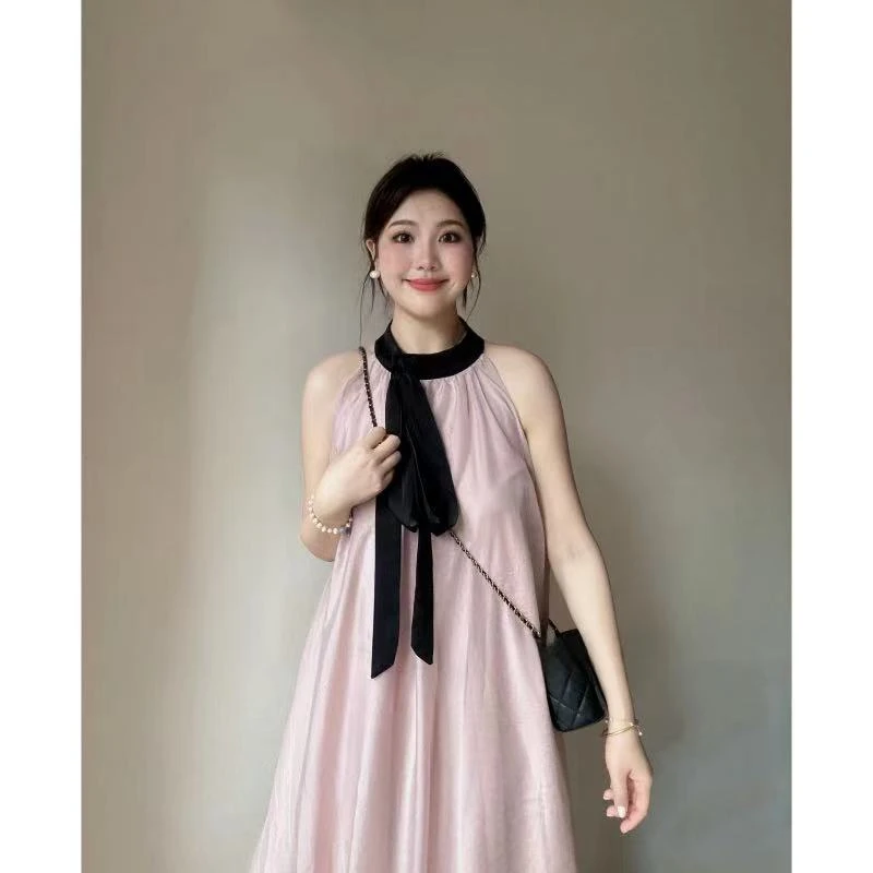 2024夏季新款法式粉色无袖蝴蝶结挂脖吊带连衣裙温柔减龄气质长裙