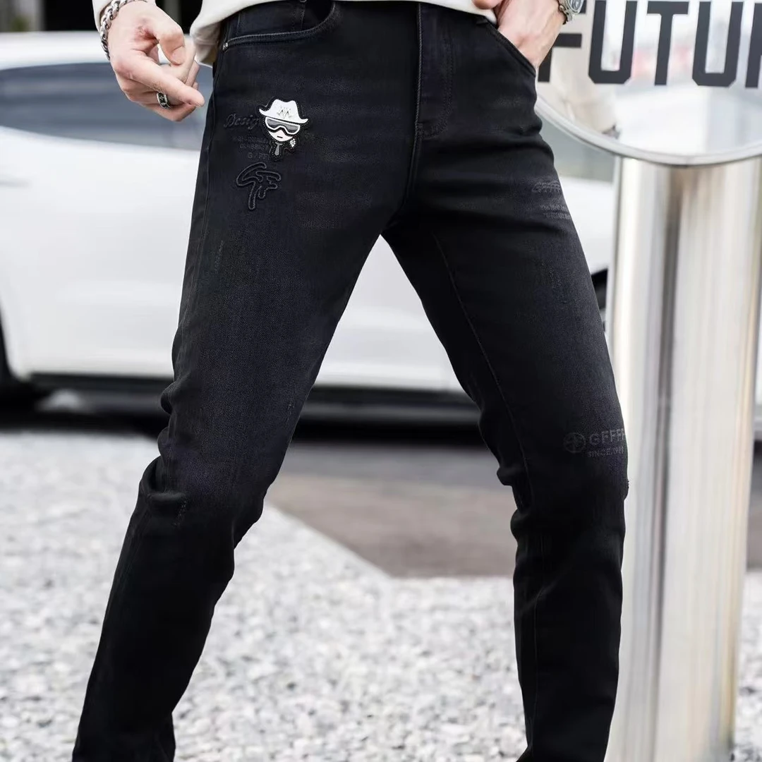 新款高端男士潮流百搭个性烫钻小人休闲牛仔裤240F9137Z