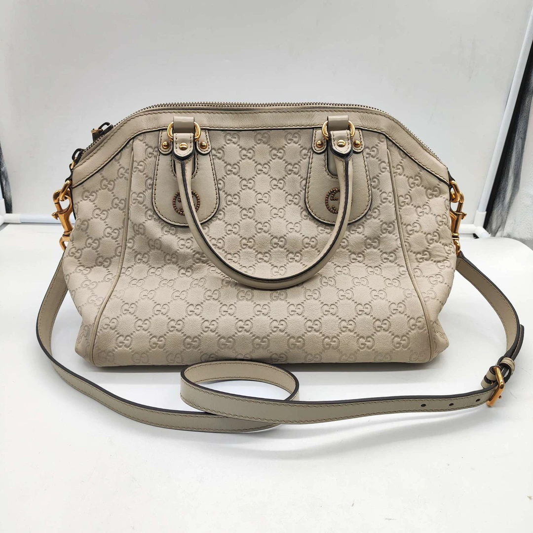 95新 GUCCI/古驰 古驰 白色 老花 斜挎 _/813 0034