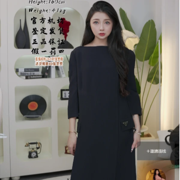 K亿颗潮奢99新 倒三角钢标长袖连衣裙 42码 V124