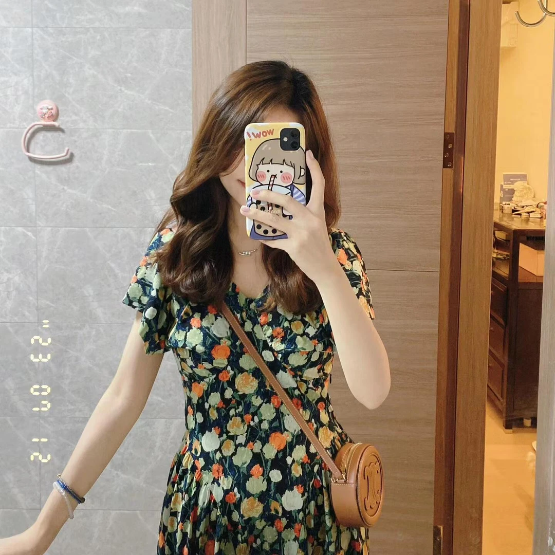 油画少女法式碎花连衣裙女纯欲性感温柔高级感大v领设计感长裙子