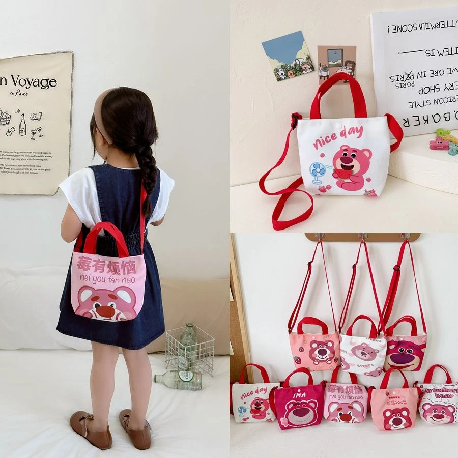 草莓熊包包儿童2023新款春夏时尚帆布包单肩包手提袋可爱休闲包