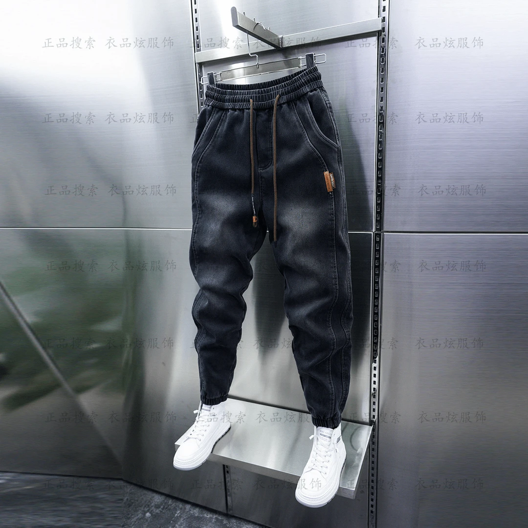 潮流男士秋冬季加绒黑灰色牛仔裤松紧腰拼接小脚裤弹力束脚哈伦裤