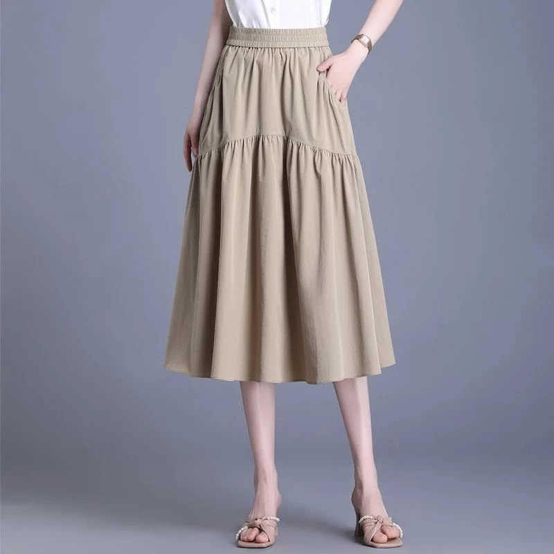高级设计感气质洋气复古赫本风遮跨显瘦A字松紧腰半身裙夏季伞裙