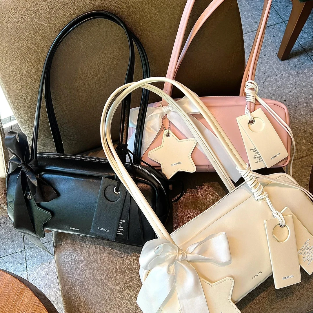 stando*l韩国ST法棍包2024新款小众腋下包丝带蝴蝶结包枕头包