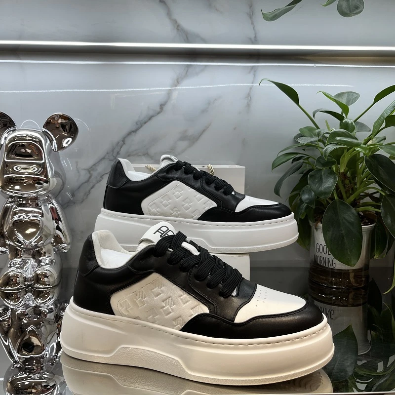 欧洲站四季新款全牛皮材质经典黑白时尚百搭休闲小胖丁厚底板鞋