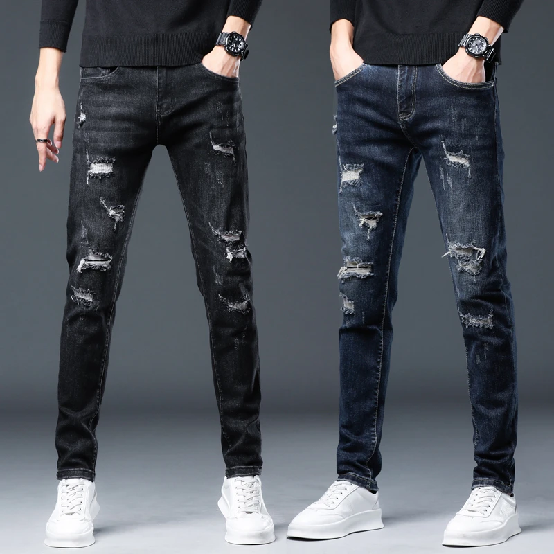 7651秋冬季新款潮流破洞补丁街头时尚修身小脚装备牛仔裤