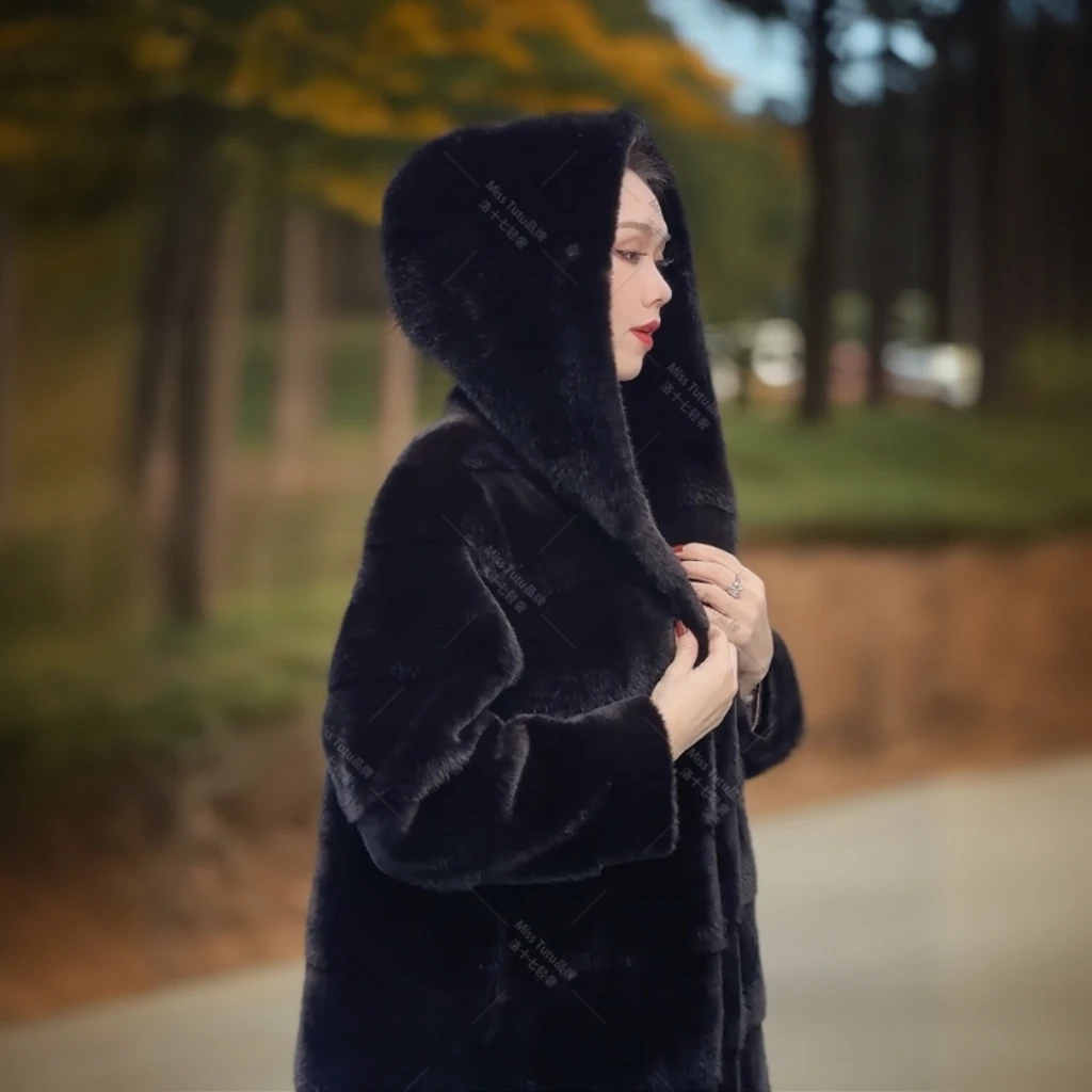 Miss TuTu2024新款气质皮毛一体中长款连帽冬季外套黑色厚大衣