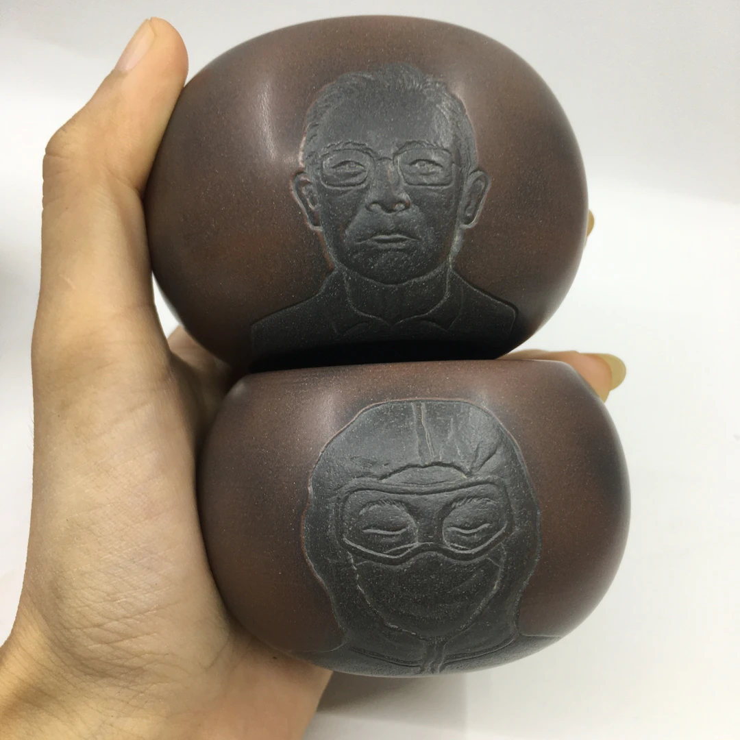 2个装坭兴陶主人杯