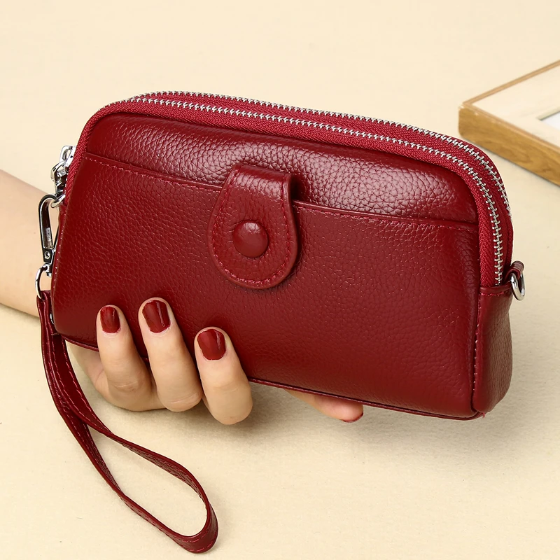 真皮手拿包女士中年妈妈包韩版简约休闲百搭放手机零钱包长款牛皮