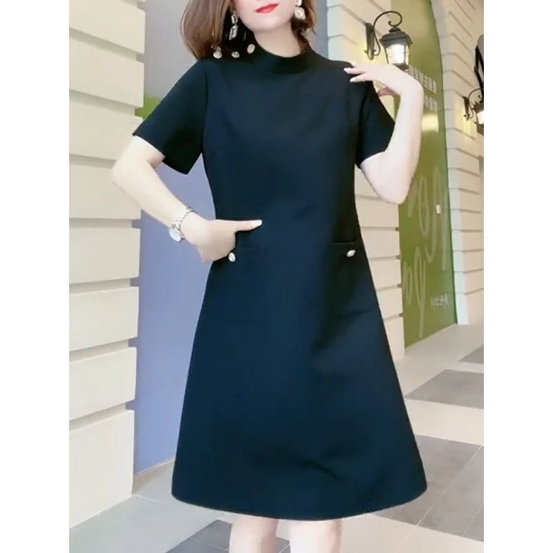 气质纯色肩扣装饰圆领短袖连衣裙女2025夏季新款时尚年轻遮肉中裙