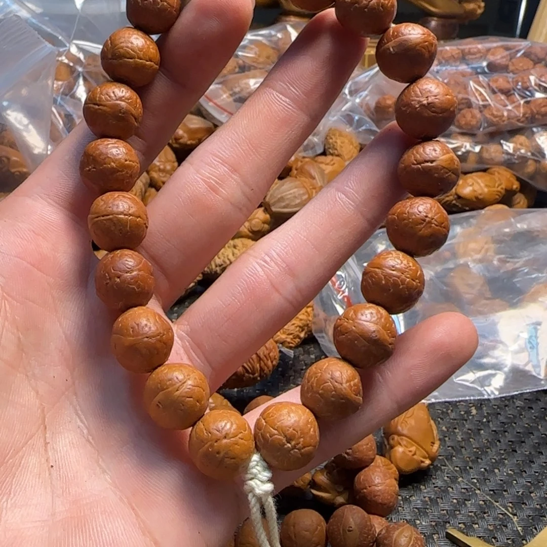 橄榄核核雕猴头凤眼