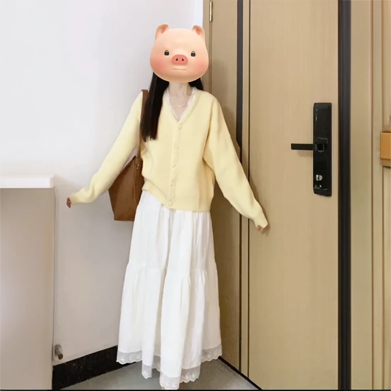 甜美可爱蝴蝶结白色吊带连衣裙女奶黄色温柔开衫毛衣外套两件套装