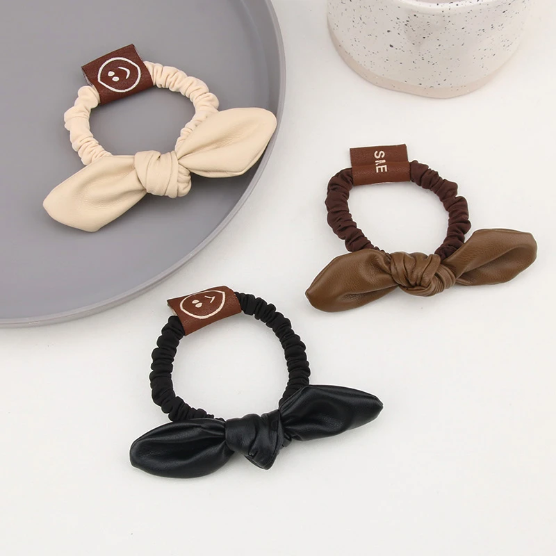 可爱减龄蝴蝶结发圈皮质发绳简约丸子头绳少女高弹力成人马尾百搭